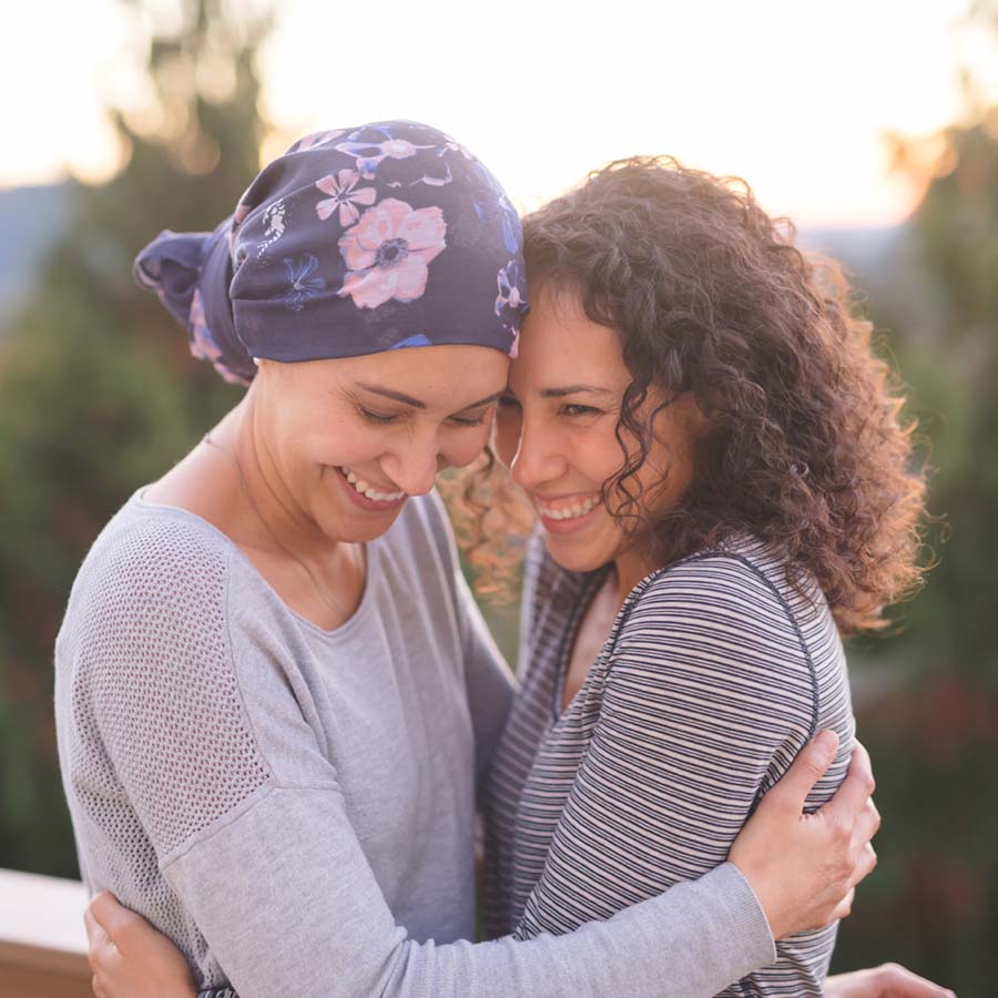 cancer patient hugging daughter